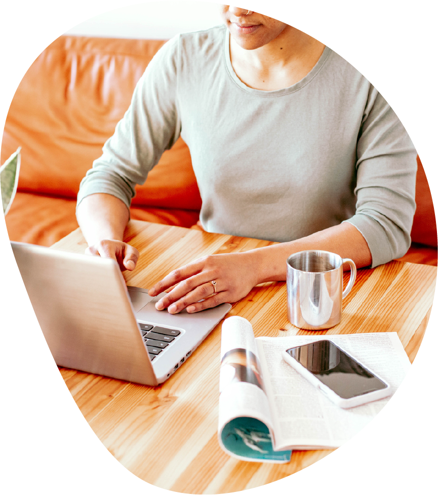 Person sitting in front of a laptop